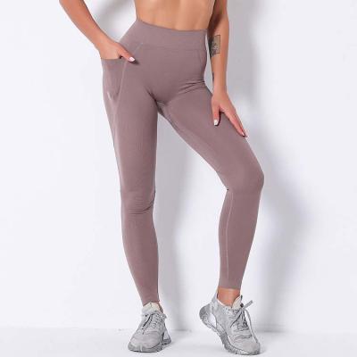 China Plus Size Breathable Yoga Set Women Pants With Pockets Workout Gaiters For Running Yoga Exercise Legging With Custom Logo for sale