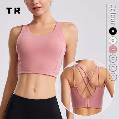 China Breathable Fashionable Back Clips Yoga Feel Nake High Support Strappy Sports Bra Top Cross Adjustable Back Clip Tops for sale