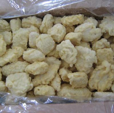 China Low Sugar Hot Selling Pre-fried Tempura Hake Nugget for sale