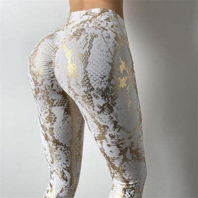 China Low price tik tok hot stamping honeycomb snake print breathable fitness leggings leggings yoga squat proof jogging leggings for sale