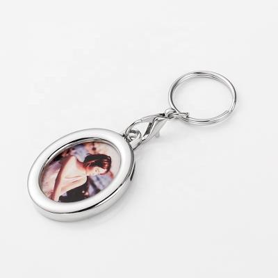 China Promotion Gift In Stock Blank Sublimation Oval Silver Key Chain For Photo Cheap Custom Keychains for sale