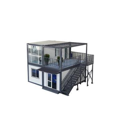 China Double Design Modern Steel Structure Prefab House Flat Pack House Container Living Prefab House For Sale for sale