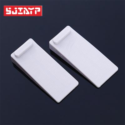 China Affordable Gray Rubber Door Stoppers Resistant Non-scratch Holder Wedge Security Door Stops and Anti-Slip Design for sale