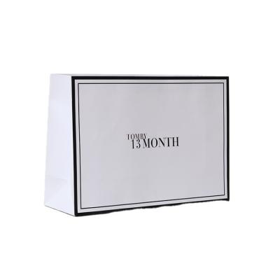 China Recyclable OEM Black Custom Gold Logo Luxury Boutique Shopping White Paper Gift Bags With Handles Paper Bags for sale