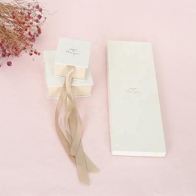 China Recyclable Custom Elegant Logo Jewelry Packaging Paper Gift Boxes With Ribbon Closure for sale