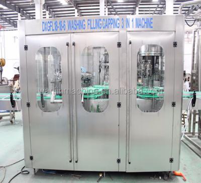 China DCGF32-32-10 Glass Beverage Bottle Carbonated Soft Drink Filling Machine/CSD Factory Line for Best Price for sale