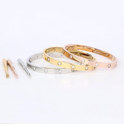 China High Quality 316L Stainless Steel Designer Jewelry Couple Titanium SCREW LOVE Bracelets Bangles For Women Men for sale