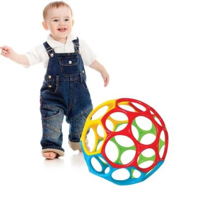 China Child Toy Gifts Customized Safety Eco-friendly Fitness Hand Grip Sensory Soft Shaking Easy Grasp Oball With Holes Rattle Ball For Kids for sale