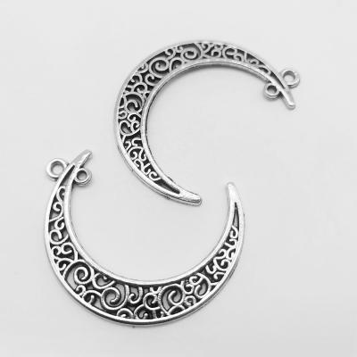 China Good Price TRENDY Metal Making Accessories Metal Double Hole Hollowing Out Crescent Shape Charm Pendant Zinc Alloy Jewelry for sale