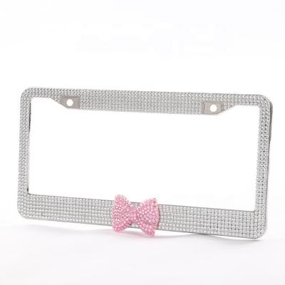 China NO Diamond-encrusted American cute bow license plate frame fashion car license plate appearance decoration frame sparkling car lice for sale