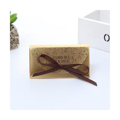 China Recyclable Golden Triangle Sugar Box Wedding Souvenir Xianshengyuan Ferrero Two Pieces Wedding Anniversary Gift Box for sale