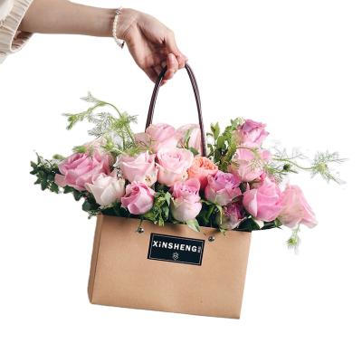 China Wholesale china recyclable factory direct sale flower bucket bag custom paper bag for flower customized flower carry bag for sale