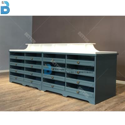 China Island Color Wooden Cabinet Customized Wooden Display Rack For Underwear Clothes Display for sale