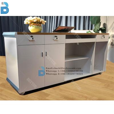 China Simple PLY/MDF/SOLID WOOD/GLASS training institution reception beauty salon reception desk for sale