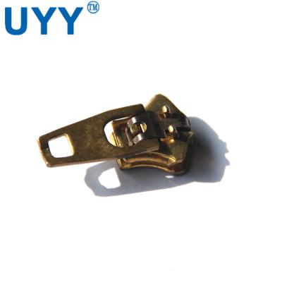 China Brass Reversible Jeans Puller 4YG 4# Slider Nickel Free for sale