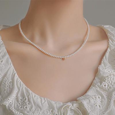 China Vintage 3-4mm Near Real Natural Freshwater Cultured Small Round Tiny Baby Pearl Necklace Designs For Women for sale