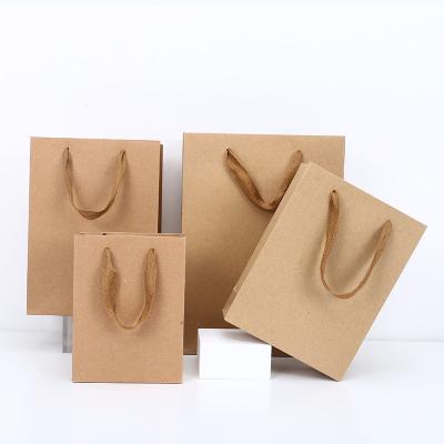 China Recycled Brown Materials Kraft Paper Bag Shopping Kraft Paper Brown Paper Handbags for sale