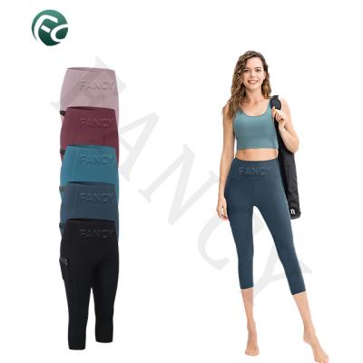 China Anti-wrinkle Women's Tight Yoga Pants Girls' Middle Shorts 2022 New High Quality Bike Shorts for sale