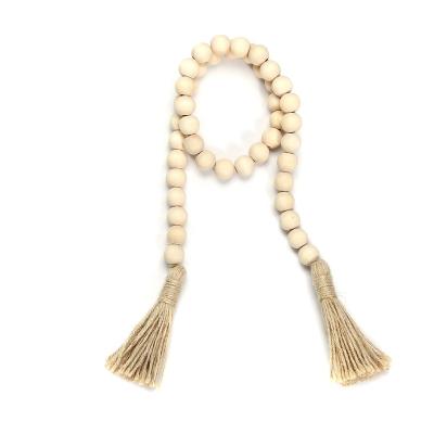 China European and American Europe Wooden Wall Hanging String Bead Prayer Decor Beads with Tassels for sale