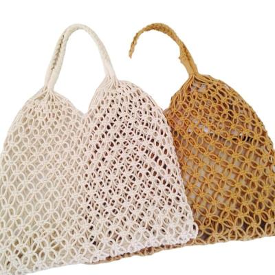 China New Large Capacity Summer Vacation Beach Cotton Rope Hand Made Woven Bag For Women Hollow Out Mesh Tote Bag for sale