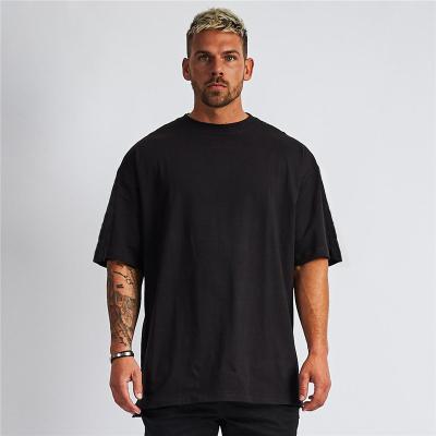 China Anti-wrinkle new design luxury quality cotton loose fit little drop shoulder brand white men's T-shirt oversized for sale