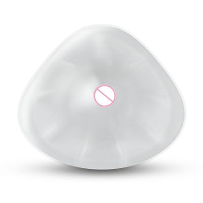 China Eco-friendly artificial prosthesis 100% transparent silicone silicone boob woman breast form triangle shape deep concave posterior for sale