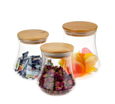 China 2021 Modern Hot Selling Glass Candy Glass Storage Jar With Air Tight Bamboo Lid for sale