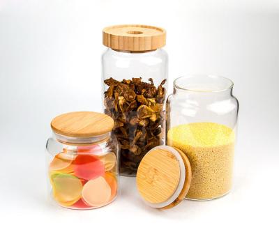 China New Modern High Quality Food Storage Jar With Air Tight Bamboo Lid Glass Candy Jar for sale