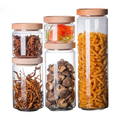 China New Design Modern Wholesale Price Storage Jar With Air Tight Wood Lid Glass Candy Jar for sale