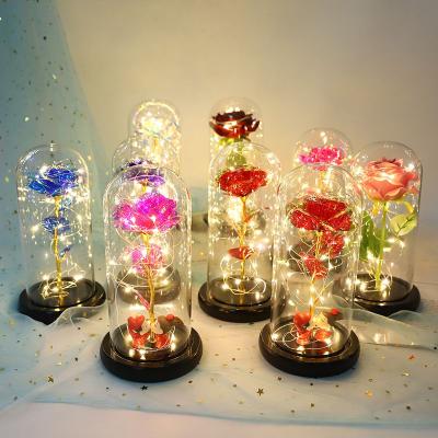 China Fashional Rose Preserved Flower Glass Dome Cover Wood Base Led Gold Foil Rose Flower Christmas Gift Valentine Day for sale