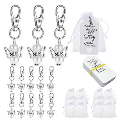 China Metal Guardian Angel Wings Keychain Church Memorial Wedding Gift Anniversary Gift Metal Key Chain With Beads for sale