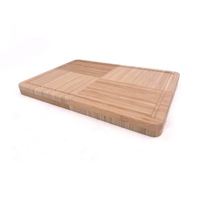 China Traditional Serving Tray Bamboo Cutting Board with Juice Groove for sale