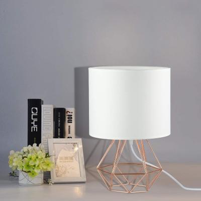 China Retro/American country simple design small industrial white cylindrical lampshade gold bracket bedside lamp table lamp power lamp for sale