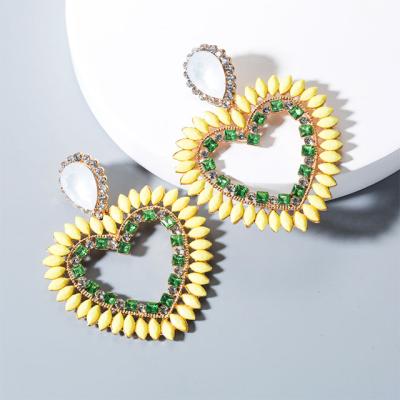 China Retro 2020 New Chocolate Heart Earrings With Diamonds Full Diamond Earrings Women for sale