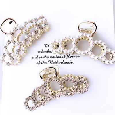 China Gemstone Hair Pin Woman Luxury Hair Claw Environmental Friendly Shiny Golden Pearl Hair Clips Factory Outlet for sale