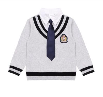 China Custom Embroidered School Logo School Uniforms Kindergarten Primary School Uniforms for sale