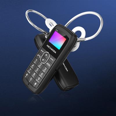 China 0.66 Inch Sports FM Radio KECHAODA K10 In Ear Mobile Phone Icds Super Mini Mobile Phone for sale