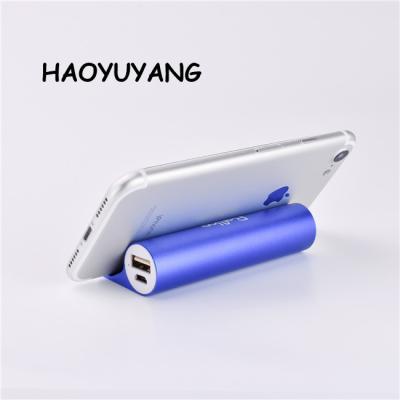 China 2021 fast charging support mobile phone holder 2600mah power bank alloy cylinder power supply à venda