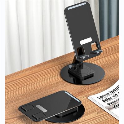 China Adjustable Desktop Dual Folding 360 Rotatable Mobile Phone Tablet Stand Aluminum Alloy for Office Desk for sale