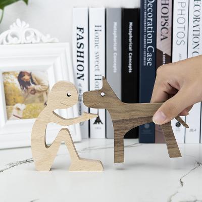 China Europe Human and Woman Dog Craft Figurine Wooden Carving Creative Home Office Model Decoration Table Ornament Family Desktop Puppy for sale