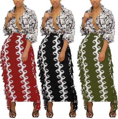 China OUDINA Anti-static Stylish Creative Slim Fit Tassel Skirts Colorblock Printing Midi Fringe Casual Skirt for sale