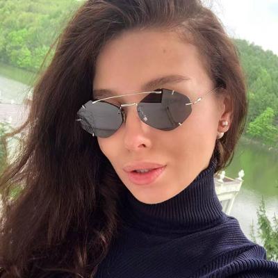 China Fashion sunglasses wholesale new sunglasses luxury small frame men's and women's fashion CIA retro metal rimless sunglasses for sale