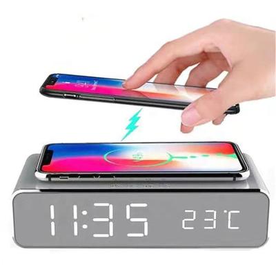 China Multifunctional Led Desktop Laptop Station Wooden Alarm Clock Qi Phone Fast Wireless Charger for sale