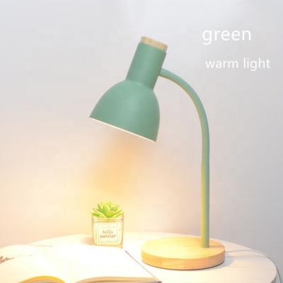 China Nordic Simple Modern Dormitory Study Office Desk Lamp Solid Iron Wood Student Led Eye Protection Reading Bedside Lighting Table Light en venta