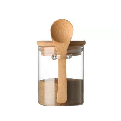 China Wholesale Freshness Preservation Salt Jar Clear Sealed Storage Glass Jar With Lid And Bamboo Spoon For Kitchen for sale