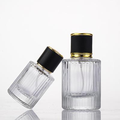 China Vertical Stripe Cosmetics Custom Logo 30ml Bottle Spray Glass Separate Perfume Bottle for sale