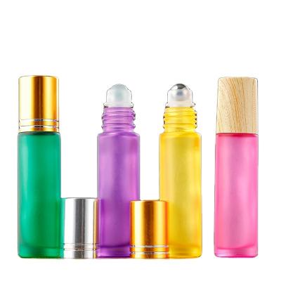 China Wholesale 5ml 10ml Cosmetic Essential Oil Roll On Perfume Glass Bottle With Trackball for sale