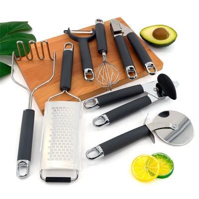 China New Viable Kitchen Utensils Set Kitchen Instruments Peeler Can Opener Potato Crusher Garlic Press Pizza Cutter for sale