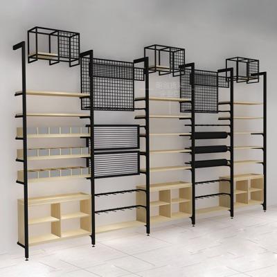 China Convenience Clothing Store Single Sided Modern Wood And Steel Wall Display Racks for sale