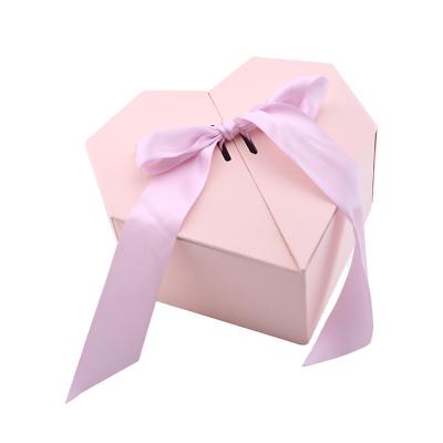 China Luxury Unique Design Recycled Materials Printing Color Heart Love Shape Valentine's Day Or Christmas Gift Box Pink Wedding Favors Box With Ribbon for sale